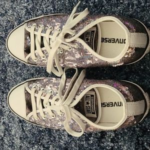 Converse silver sequence shoes.